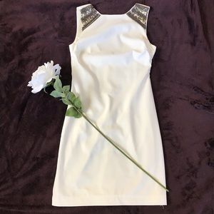 A white dress with embellishment